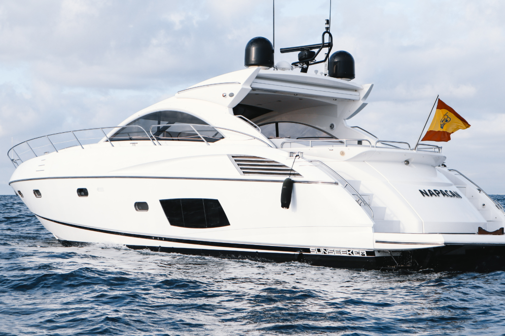 The Sunseeker Predator 60 yacht sailing, showcasing its sleek design, power, and exclusive comfort for an unparalleled experience.